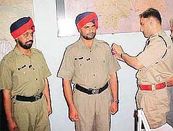 DIG Rohit Choudhry honours two constables