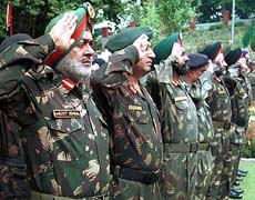Army officers salute the soldiers