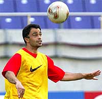Belgium's midfielder Johan Walem controls a ball during a training session