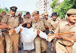 Malwinder Singh Kang, president of the Panjab University Students� Union, on indefinite fast, being taken away for medical examination, in Panjab University, Chandigarh, on Monday.