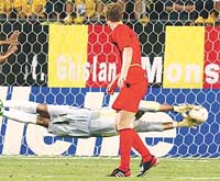 Brazil's Rivaldo is airborne as he kicks the ball 