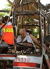 A few minutes after the explosion, Israeli medics enter the bus next to the body of the bus driver