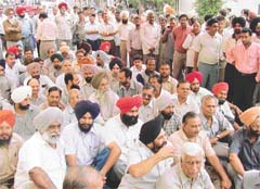 Members of the Telecom Engineering Officers Association stage a dharna