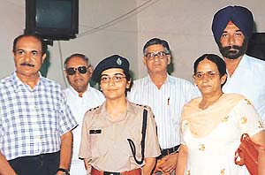 Superintendent of Police Charu Bali with family members of Kargil martyrs, on the occasion of Kargil Divas at the Day Care Centre