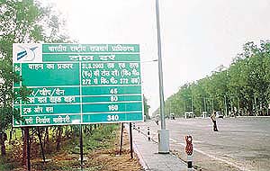 A hoarding set up by the National Highway Authority of India diplaying the toll