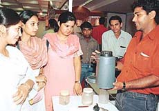 Visitors at one of the stalls of Kitchen Fair at the CII in Chandigarh on Friday. 