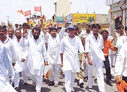 HVP activists taking out a rally in Rewari on Friday