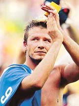 English captain and midfielder David Beckham cries at the end of the England/Brazil quarterfinal match 