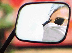 With intense heat and humidity a beauty conscious Ludhianavi girl hides her face behind a scarf