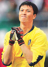 South Korea goalkeeper Lee Woon-jae celebrates after his team beat Spain 5-3 on penalties in their World Cup quarter-final in Kwangju on Saturday.