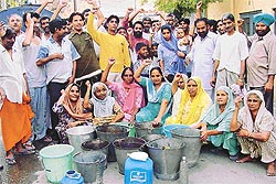 SURROUNDED BY WATER, BUT NOT A DROP FOR THEM