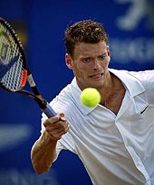 Dutchman Sjeng Schalken plays a return during the Ordina Open Grasscourt Tennis tournament final to French Arnaud Clement in Den Bosch 