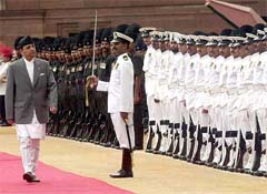 Nepal's king Gyanendra inspecting the guard of honour 