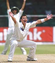New Zealand bowler Shane Bond celebrates taking his third wicket against the West Indies 