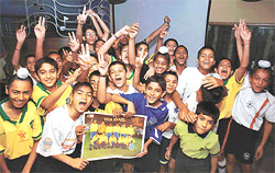 REACHING A CRESCENDO: Soccer players of St. Stephens Football Academy in a jubilant mood after Brazil�s victory over Turkey, at Classic Hotel in Chandigarh on Wednesday. 