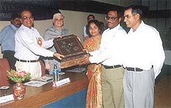 Prof V.K.Patil, president of Association of Indian Universities, giving away the Dr B.L.Gupta Trophy for all-round performance 