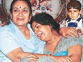 Grieving mother (right) of Rishab Kapoor