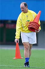 Brazil's soccer coach Luiz Felipe Scolari puts down cones