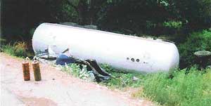 An overturned gas tanker on the GT Road near Kauri village