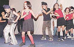 Children perform at the concluding function of a 15-day workshop