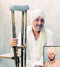 A hapless Gulzar Singh waits for his son (inset) Babu Singh