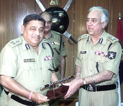 Outgoing Director-General of BSF Gurbachan Jagat handing over the baton