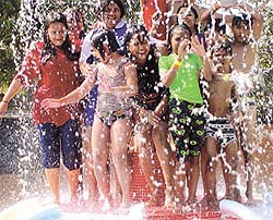 Children enjoying a shower