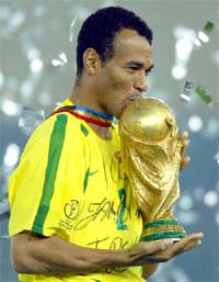 Brazil's captain Cafu kisses the trophy