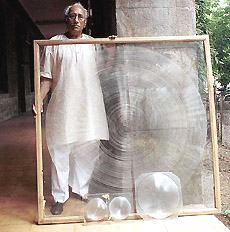 Scientist Narendra Sheth with giant acrylic fresnel