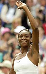 Venus Williams of the USA waves to the crowd