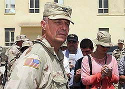 US army Colonel Roger King speaks during a news conference