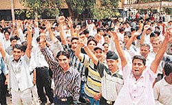 Reserved-category candidates seeking admission to Class XI protest outside Government Model Senior Secondary School, Sector 23, Chandigarh, on Wednesday, after their applications were rejected.
