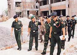 The Chief of the Staff, Western Command, Lieut-Gen H.S. Kanwar (second from left), with other senior officers review the construction of the Army Institute of Law in SAS Nagar on Wednesday.