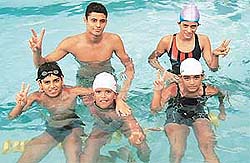 Vivek, Karan, Puneet, Gurnool and Himanshu, who won titles in their respective categories in a swimming meet at the Yoga Centre, Sector 23, Chandigarh, on Wednesday.