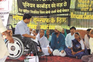 Disabled Rights Group convenor Javed Abidi visiting Bhopal gas tragedy victims