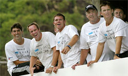 Members of the New Zealand team laugh from their clubhouse during one of many rain delays on the final day of the second Test in St. George's, Grenada