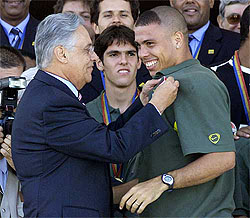 Ronaldo receives a medal from Brazil's President 