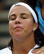 Jennifer Capriati receives treatment during her match