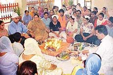 Students and teachers of Springdale Public School in the midst of a havan ceremony 