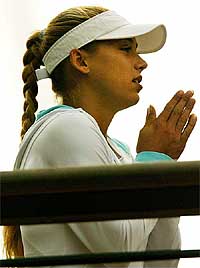 Russia's Anna Kournikova awaits the start of play