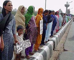 Ahmedabad riot victims demonstrate against the Modi government 