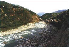 The Ravi quietly flows by Chamba. 