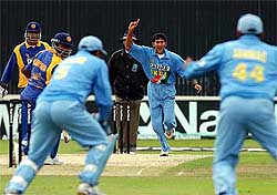 India's Ajit Agarkar claims the wicket 