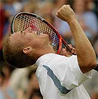 Australia's Lleyton Hewitt celebrates his victory over Britain's Tim Henman