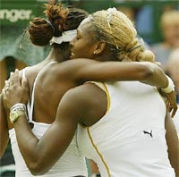 Serena and Venus Williams embrace 