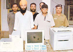 Daljeet And Gangandeep arrested by the Crime Branch of Chandigarh Police for forging black film permission stickers and degrees of different universities in Sector 11, Chandigarh, on 