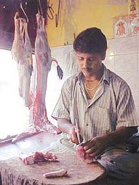 A meat seller at his shop in Ambala Sadar