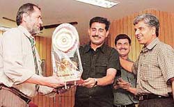 A senior Afghan police official, Maj Gen Gul Mohammed, receives a memento from IGP of Chandigarh Police, Mr B.S. Bassi (extreme right), at the concluding function of a week-long training programme at the Central Detective Training School in Sector 36, Chandigarh, on Saturday.