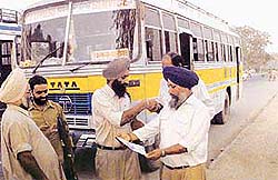 A private bus that was stopped by members of the CTU Employees Union for allegedly picking commuters in Chandigarh on Friday.