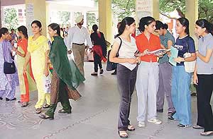 Cheerful students sashay down the college corridors on the first day of the new session in the Government College for Girls, Sector 11, Chandigarh